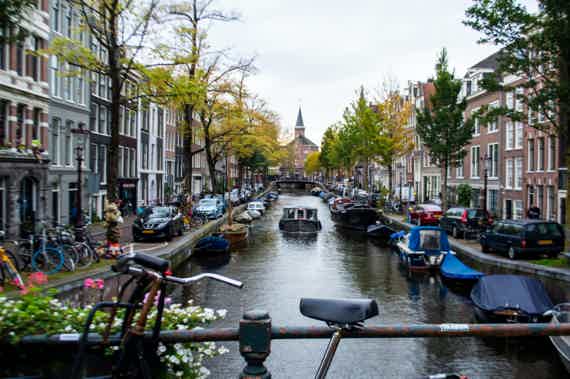 Тур пешком или на велике, а затем на лодочке по Амстердаму