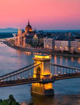 Admire Budapest at sunset from the river