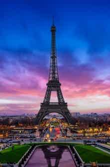 Cruise past Paris illuminated at night