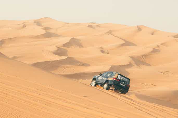 From Dubai: Lehbab desert Safari w/ Camel riding & Sandboarding